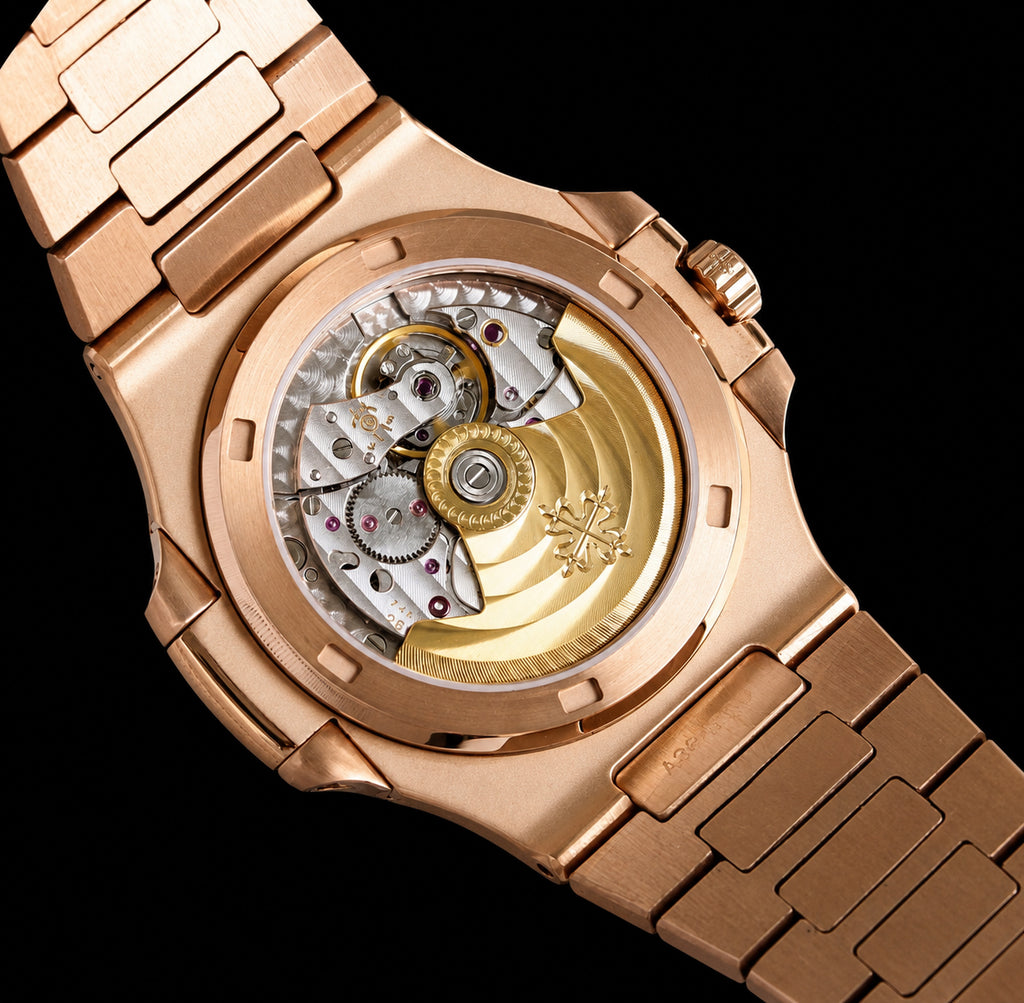 Nautilus en oro rosa con esfera marrón