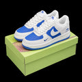 Dunk Low en blanco y azul royal